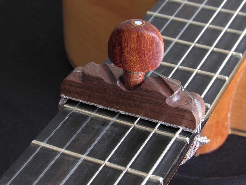 Cejilla artesana de Nogal