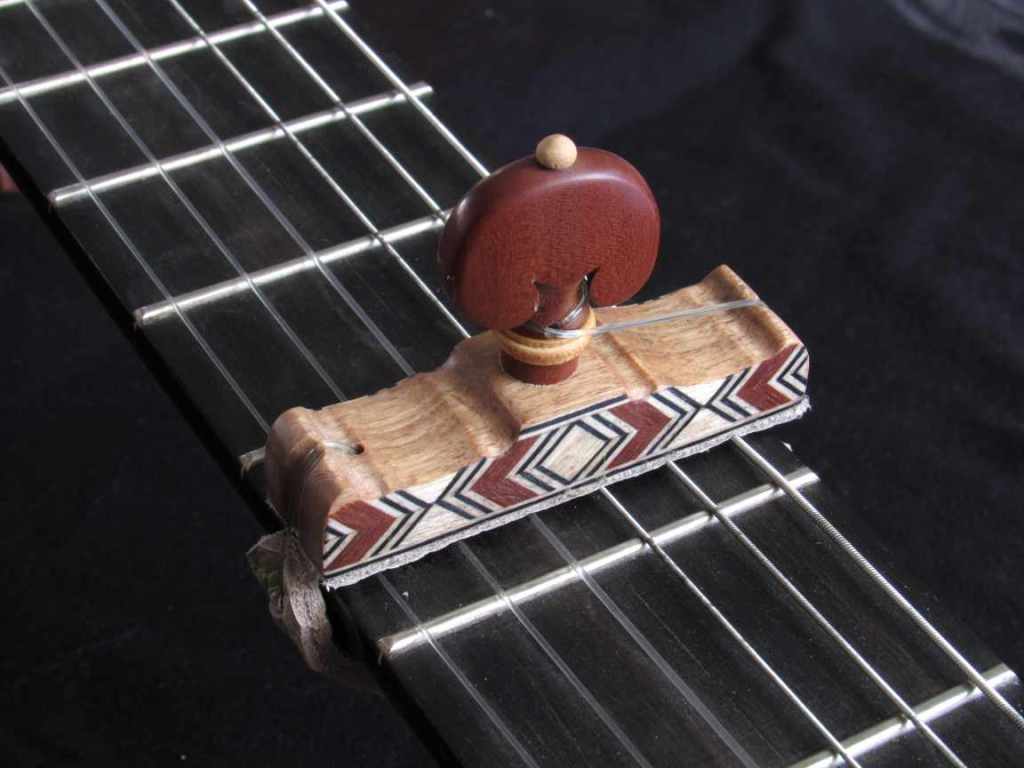 Cejilla flamenca con taracea